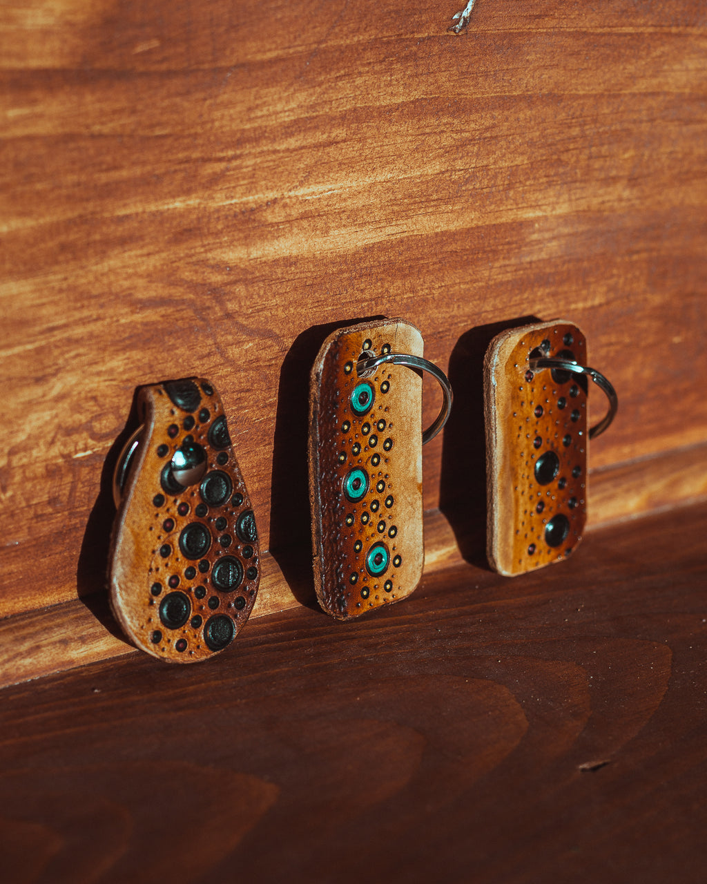 Leather key chain tag with trout stamp detail – oil finished